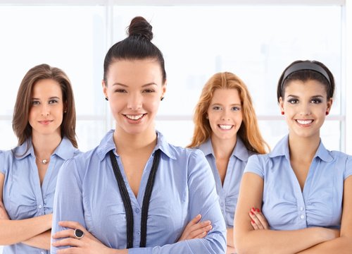 Female front office workers in uniform