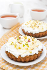 mini carrot cakes with cream of mascarpone and honey on a plate