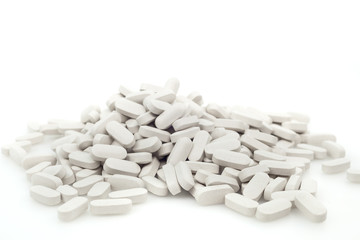 Fototapeta na wymiar Group of medicine pills on white background