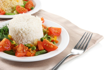 Delicious risotto with vegetables isolated on white