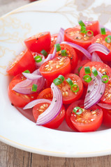 tomato cherry salad with  black pepper and onion
