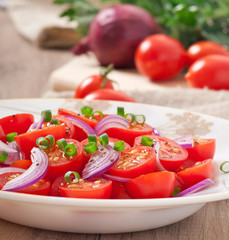 tomato cherry salad with  black pepper and onion