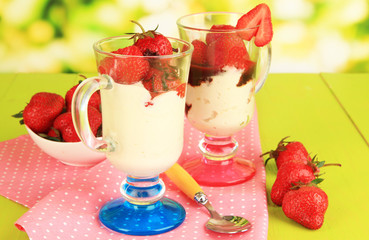 Delicious strawberry desserts in glass vase