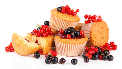 Tasty muffins with berries isolated on white