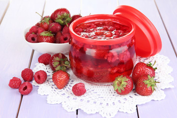 Home made berry jam on wooden table