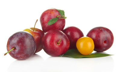 Ripe plums isolated on white