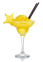 Yellow alcohol cocktail with fruit ice crush and carambola slice