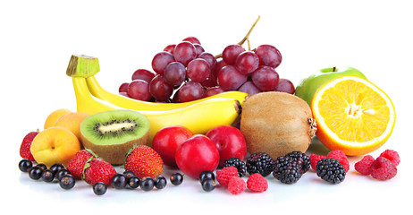Fresh fruits and berries isolated on white