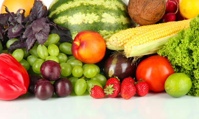 Different fruits and vegetables on white background