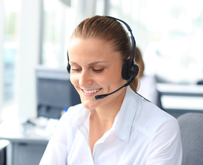 Beautiful young female call center operator