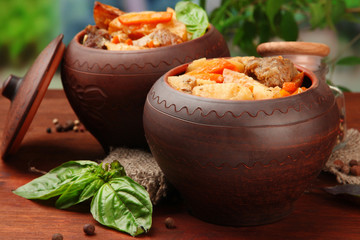 Homemade beef stir fry with vegetables in pots