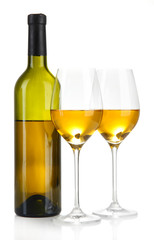 Wine bottle and wineglasses with white wine, isolated on white