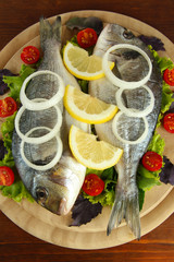 Dorado fish on table close-up