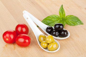 Olives, tomatoes and basil