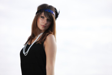 Flapper girl .Vintage woman in 1920s style