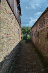 alley next to old houses