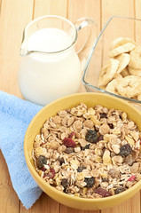 Delicious and healthy cereal in bowl with milk