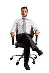 man sitting on office chair and smiling