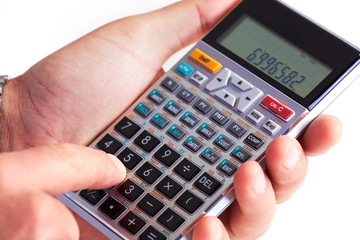 Hand with calculator.