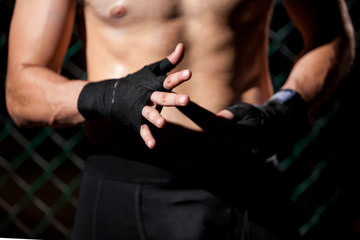 Hand Wrap in a fighting cage