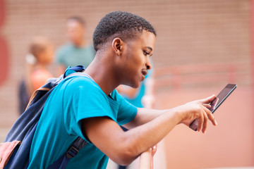 male african college student using tablet computer