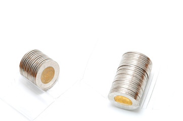 Plastic roll holding two dollar coins