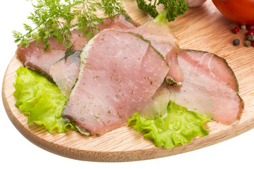 Ripe fresh ham with vegetables