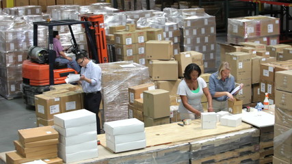 Time Lapse Shot Of Packing And Dispatching Goods - Powered by Adobe