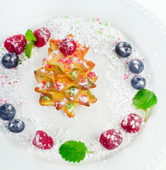 Christmas dessert -  tree of chookies with berries and mint