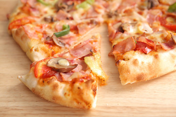 Pizza ham and mushroom isolated in white background
