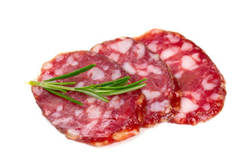 salami slices and rosemary isolated on white