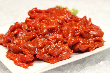 Raw marinated beef