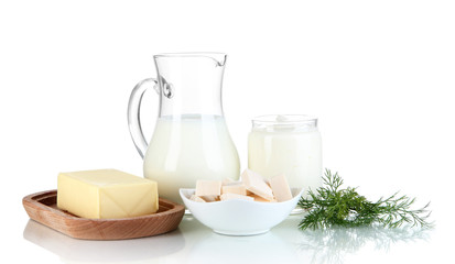 Fresh dairy products with greens isolated on white