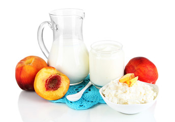 Fresh dairy products with peaches isolated on white