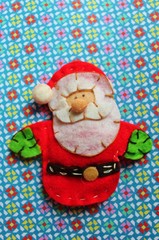 Obraz premium Christmas santa toy fabric sewn santa claus tree decoration