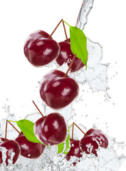 Fototapeta na wymiar Fresh cherry in water splash