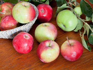 fresh summer apples on wooden table