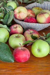 Naklejka na ściany i meble fresh summer apples on wooden table