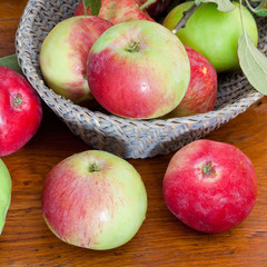 fresh summer apples on wooden table