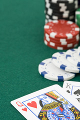 King and queen cards and poker chips