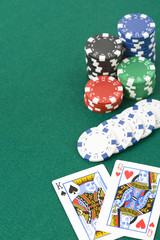 King and queen cards and poker chips