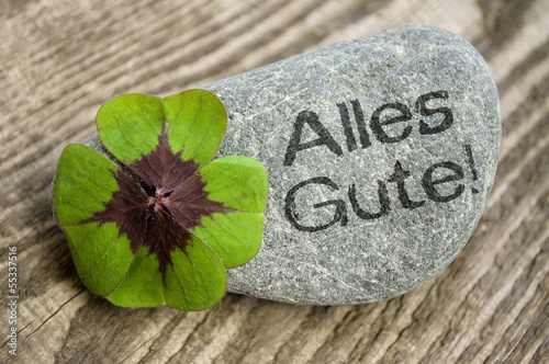 "Kleeblatt mit Stein und Alles Gute!" Stock photo and "Kleeblatt mit Stein und Alles Gute!" Stock photo and