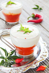 Mousse of red pepper and cream, selective focus.