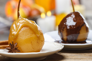 Pear with caramel sauce. French dessert