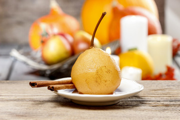 Pear with caramel sauce. French dessert