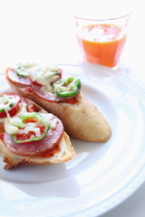 peppr and salami on bread for pizza toast image