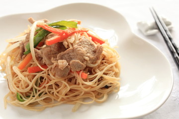 chinese food, rice noodle and pork stir fried