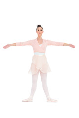 Cheerful gorgeous ballerina posing for camera
