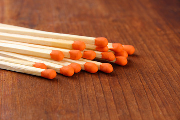 matches and dry fuel for ignition on wooden table