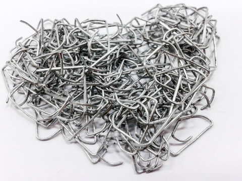 paper clips heart shaped staples background